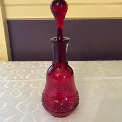 Hand blown cranberry cruet with cranberry glass stopper.  Priced at $75