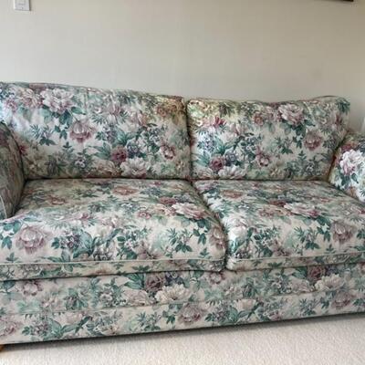 Floral 7' Two Cushion Sofa.  Smoke & Pet Free Home.  Still has a lot of life left in it!  Price is $95