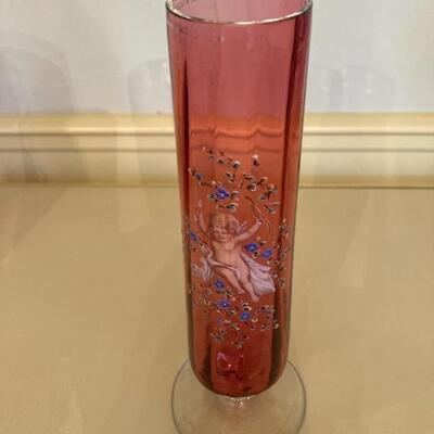 9.5" Cranberry Vase with handprinted Cherub.  Priced at $65.