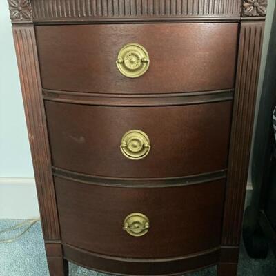Three drawer mahogany end table is priced at $95