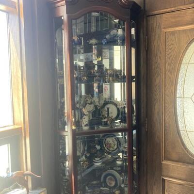 One of two gorgeous display corner cabinets.  (Pics don't do them justice) Measures 7' tall. Front glass door is 21.5