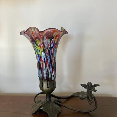 Millefiori  glass & brass trumpet lamp with Cherub.

.  Priced at $115.