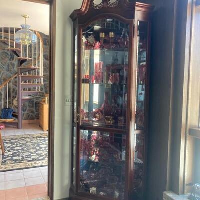 One of two gorgeous display corner cabinets.  Measures 7' tall. Front glass door is 21.5