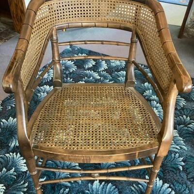 This rounded back chair has caned sides and seat.  Excellent condition with no issues with caning.  Priced at $65