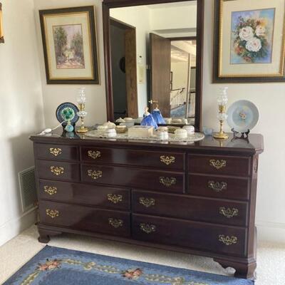 Ethan Allen Mahogany Triple Dresser with Mirror.  Measures 65
