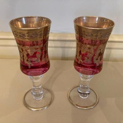 Pair of Cranberry Cordials with gold overlay.  5" tall.  Priced at $65