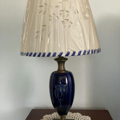 This is one of a pair of Navy blue lamps with custom cut shades.  Priced at $85 for the pair.