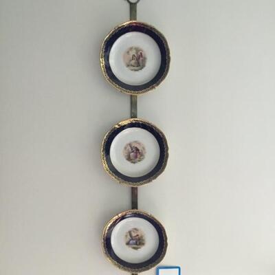#26 Three Plates in Brass Frames.  Measures 9" x 38".  Priced at $35