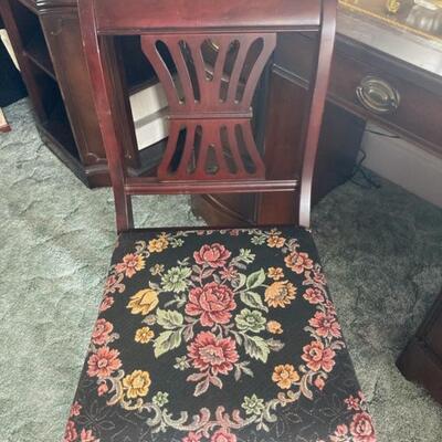 Solid mahogany side/desk chair with brocade seat is priced at $45.