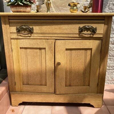 Very light Oak washstand.  Priced at $95