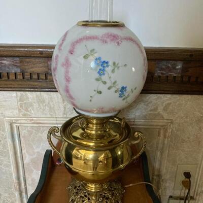 Brass converted oil lamp with handprinted glass globe.  Made by Success out of Pittsburg PA. Priced at $65.