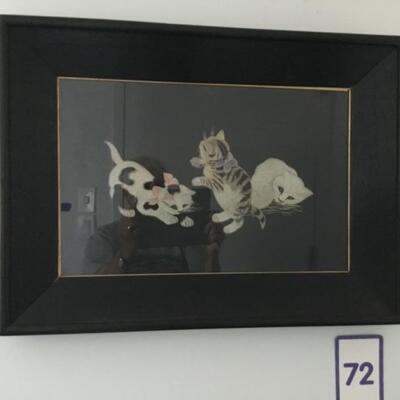 #72 Three Intricately hand stitched kittens on black background.  Frame measures 23" x 17".  Stunningly beautiful.  Priced at $75