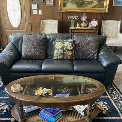 This matching black leather sofa is in good condition.  No tears, scratches or damage.  This sofa is priced at $350