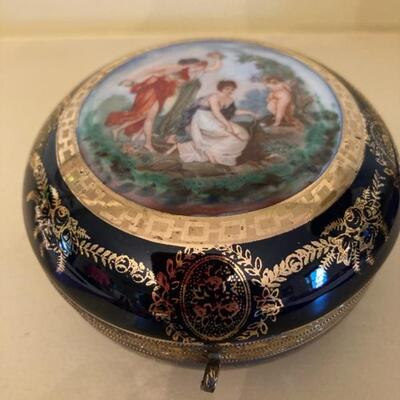 Footed cobalt blue trinket dish with hand painted women.  Priced at $55.