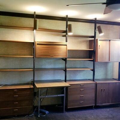 1029	MID CENTURY MODERN WALL UNIT WITH DESK, BOOKCASE, DRAWERS AND RAIL LIGHTING. RAILS ARE COMPRESSION FIT , FLOOR TO CEILING ....