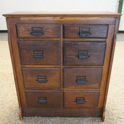 1056	COUNTRY CABINET W/ EIGHT GRADUATED DRAWERS. 33 IN W 39 IN H 17 IN DEEP. HAS CHEW DAMAGE ON THE FRONT FEET 
