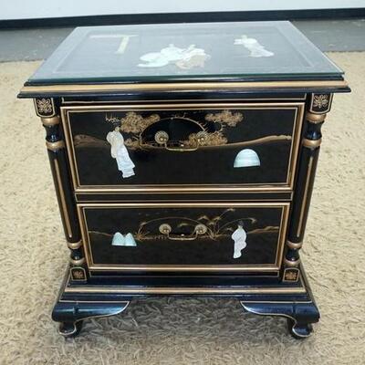 1074	2 DRAWER ASIAN STAND W/ PAINTED & RELIEF CARVED DECORATION, HAS A GLASS TOP 22 IN W, 25 1/2 IN H 16 IN DEEP
