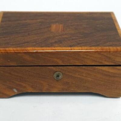 1022	SMALL MUSIC BOX IN INLAID WOODEN CASE, MADE IN SWITZERLAND, 3 TUNES. 6 IN X 4 IN X 2 3/4 IN HIGH
