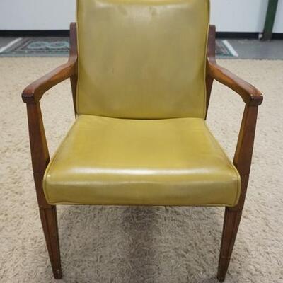 1027	MID CENTURY MODERN ARM CHAIR WITH VINYL SEAT AND CUSHION BACK
