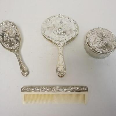 1252	SILVERPLATED DRESSER SET INCLUDING BRUSH, COMB, COVERED POWDER JAR & A MIRROR 
