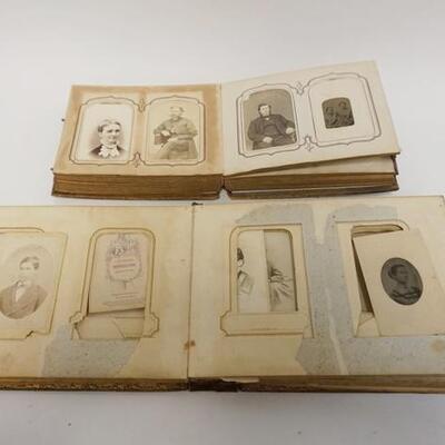 1236	TWO ANTIQUE PHOTO ALBUMS, W/ TIN TYPES. BOTH ALBUMS HAVE DAMAGE
