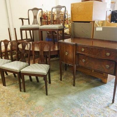 1310	8 PIECE DINING ROOM SET,TABLE, 6 CHAIRS (2 HAVE SPLAT DAMAGE) & SIDEBOARD, TABLE HAS 3 LEAVES, SIDEBOARD IS 65 IN WIDE
