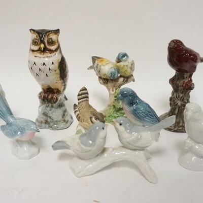 1240	GROUP OF 9 POTTERY & PORCELAIN BIRD FIGURES TALLEST IS 7 IN H 
