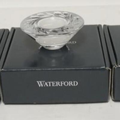1194	3 WATERFORD CANDLE HOLDERS NEVER USED IN ORGINAL BOXES 
