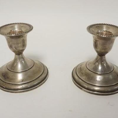 1274	PAIR OF WEIGHTED STERLING SILVER CANDLESTICKS, 3 1/2 IN H 
