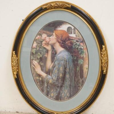 1198	PRINT OF A RED HAIRED LADY IN A NICE OVAL FRAME W/ GILT HIGH RELIF ROSES & DOUBLE MATTED. 27 IN X 33 IN INCLUDING FRAME
