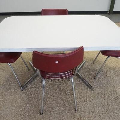 1037	NICE VINTAGE CHROME KITCHEN DINETTE SET. TABLE WITH 4 CHAIRS, TABLE IS 60 IN X 42 IN X 30 IN HIGH
