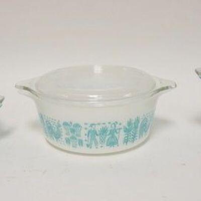 1249	VINTAGE THREE PIECE PYREX COVERED DISH SET, TALLEST IS 4 IN H 
