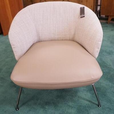 1043	NATAZZI ITALIAN LEATHER AND UPHOLSTERED MODERN STYLE CHAIR. UNUSED WITH TAGS
