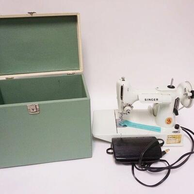 1228	SINGER 221 K WHITE FEATHERWIGHT SEWING MACHINE 8 1/4 IN X 12 1/2 IN 11 IN H 

