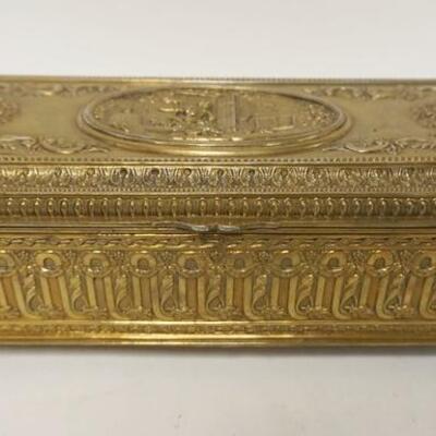 1257	ORNATE CIGARETTE BOX MADE BY JENNINGS BROTHERS 11 1/4 IN X 5 IN X 4 IN, HAS WEAR TO GILT FINISH TOP
