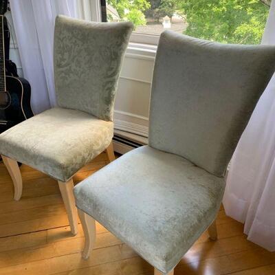 Set of 4 sage green dining room chairs.  Two are solid color two have pattern 