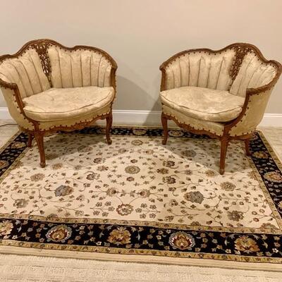 Pair of Victorian carved back walnut settees 
