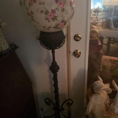 Floor lamp with a hand painted globe top