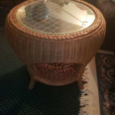Nice round rattan table with a glass top
