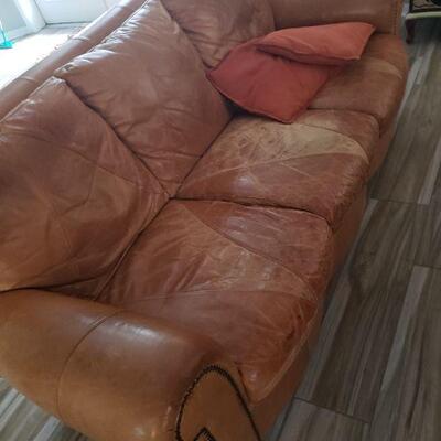 Real leather sofa, shows some wear but is in very good, comfortable, condition