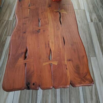 Looks to be a teak coffee table