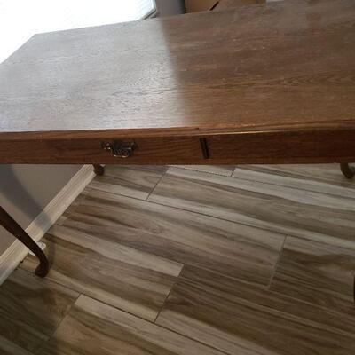 Wooden table with one drawer