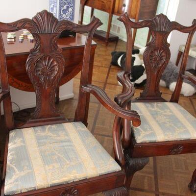 Pair of antique upholstered arm chairs