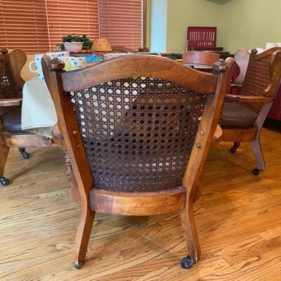 1970's Solid Wood Dining Table & 4 Cain Back Leather Seating Arm Chairs - 27.5"H x 61"W x 44"D - $220