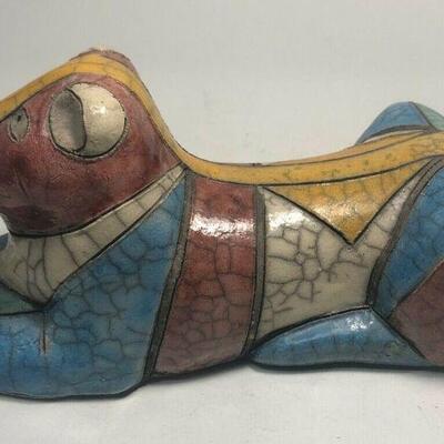 https://www.ebay.com/itm/124808682389	ME7012 South African Raku Pottery Lioness Figurine
