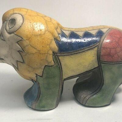 https://www.ebay.com/itm/114889038163	ME7008 South African Raku Pottery Lion Figurine

