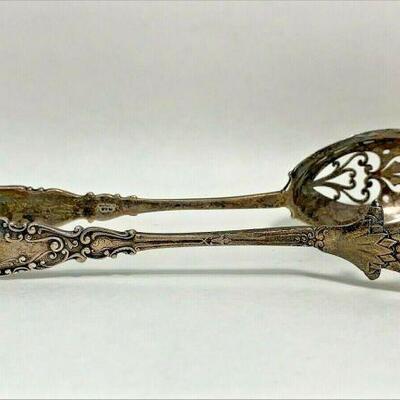 ME1028 STERLING SILVER ORNATE TONGS WITH E.H. INITIALS AND BIRD FOOT 	https://www.ebay.com/itm/114895361692
