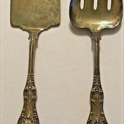ME1005 STERLING SILVER TIFFANY ENGLISH KING PATTERN PAIR OF SERVING UTENSILS 	https://www.ebay.com/itm/124814876343
