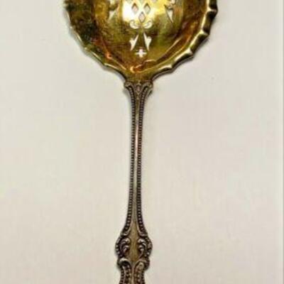 ME1021 STERLING SILVER GOLD TONE SLOTTED SPOON PAT 1895	https://www.ebay.com/itm/114895361689

