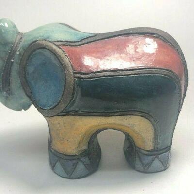 https://www.ebay.com/itm/114889014209	ME7003 South African Raku Pottery Elephant Figurine (light green head)
